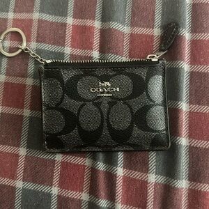 Coach black key chain wallet- used in good condition